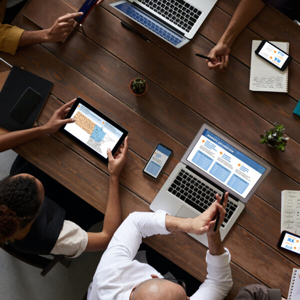 group of people with laptops collaborating