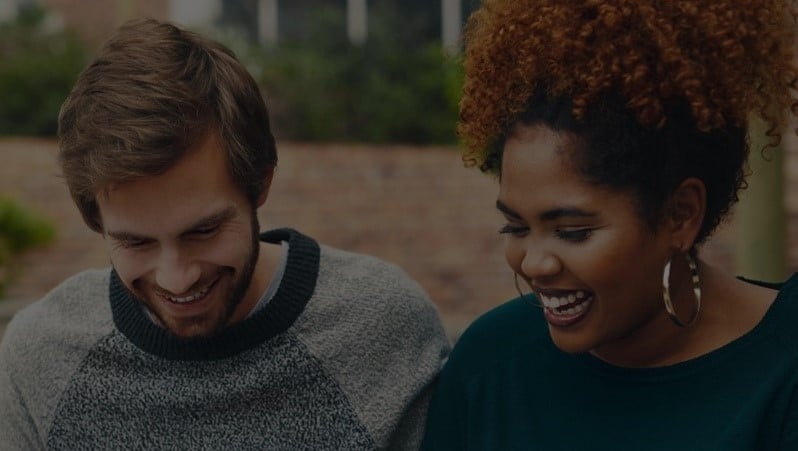 two college students smiling