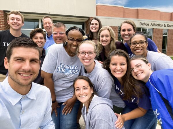 Students in a group photo smiling